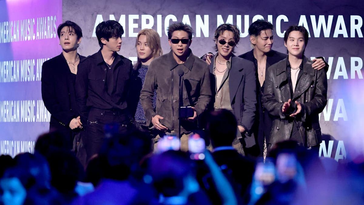 BTS accepting the Artiste of the Year award on stage at the 52nd American Music Awards at MGM Grand Garden Arena in Las Vegas
