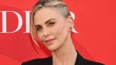 Charlize Theron Wears Three Looks in One Day for Odyssey China Tour