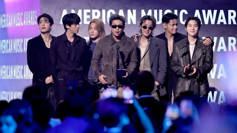 BTS accepting the Artiste of the Year award on stage at the 52nd American Music Awards at MGM Grand Garden Arena in Las Vegas