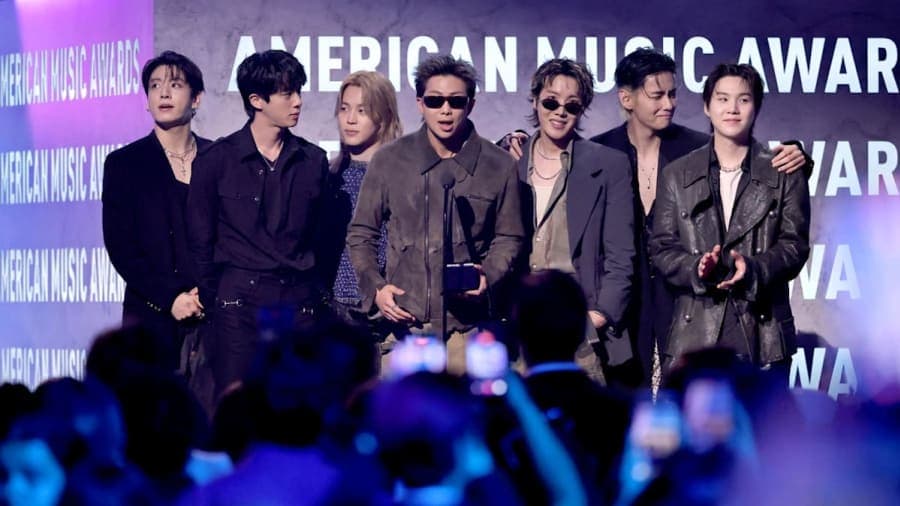 BTS accepting the Artiste of the Year award on stage at the 52nd American Music Awards at MGM Grand Garden Arena in Las Vegas